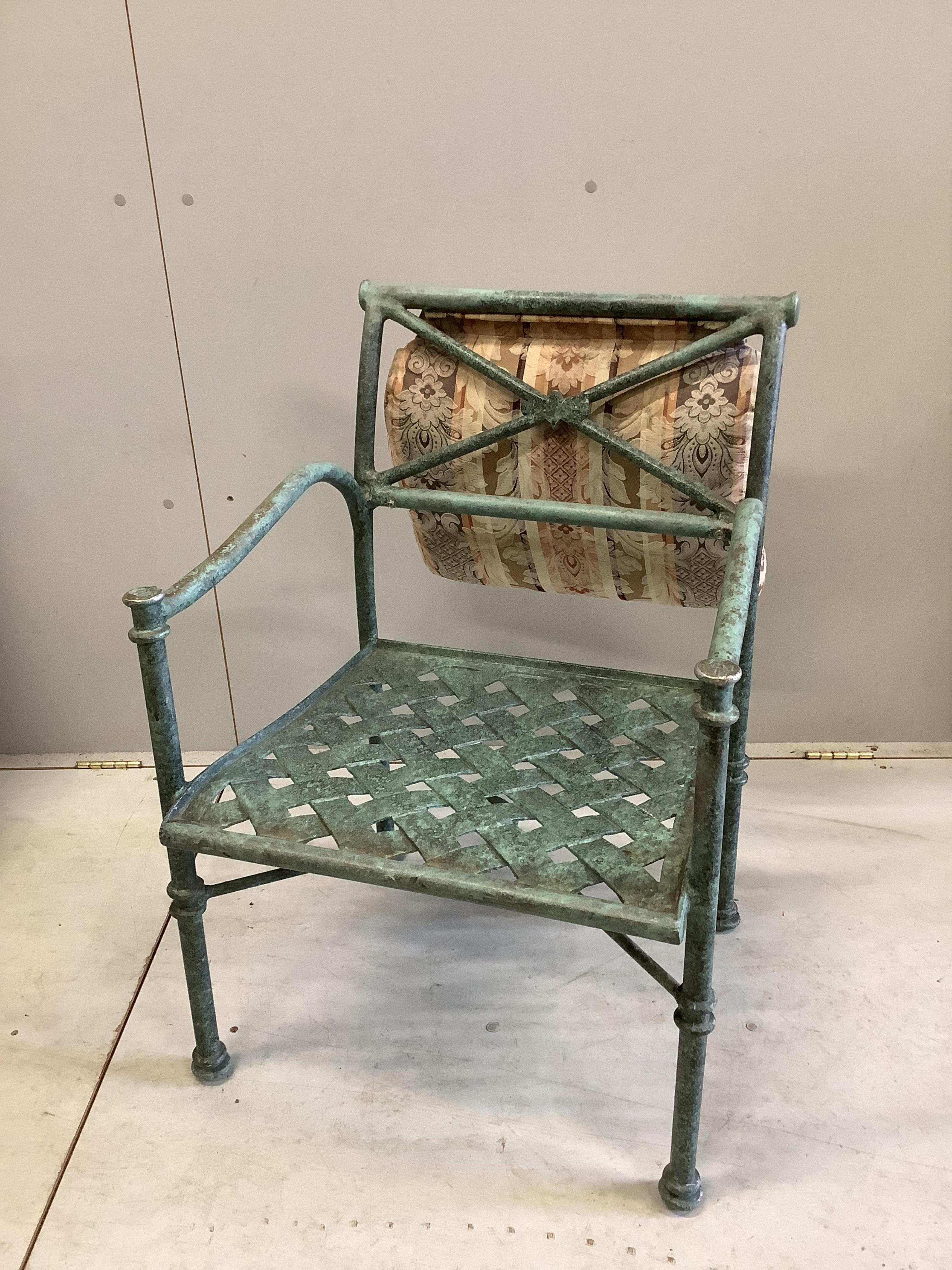 A set of four painted aluminium conservatory armchairs with cushion seats and backs, width 55cm, depth 47cm, height 80cm. Condition - fair